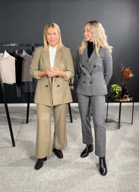 Suit trousers, Fashion design, Smile, Plant, Sleeve, Overcoat, Flowerpot, Collar, Houseplant