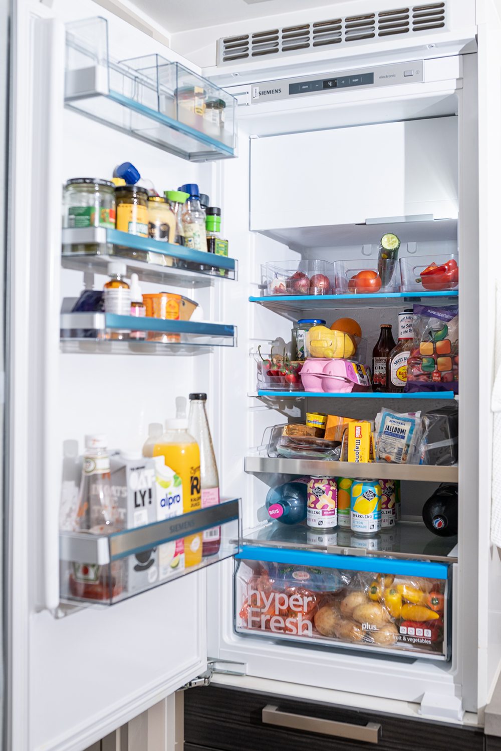 Food storage, Kitchen appliance, Bottle, Shelving, Shelf