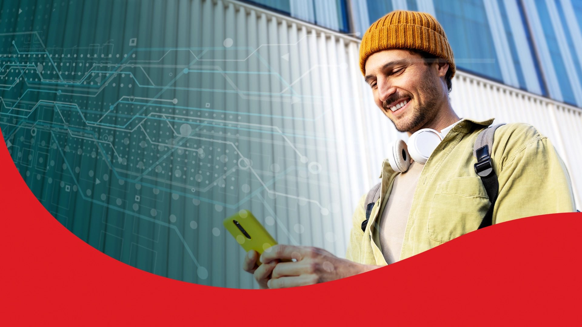 Smiling man in beanie on phone, tech background, red curve.