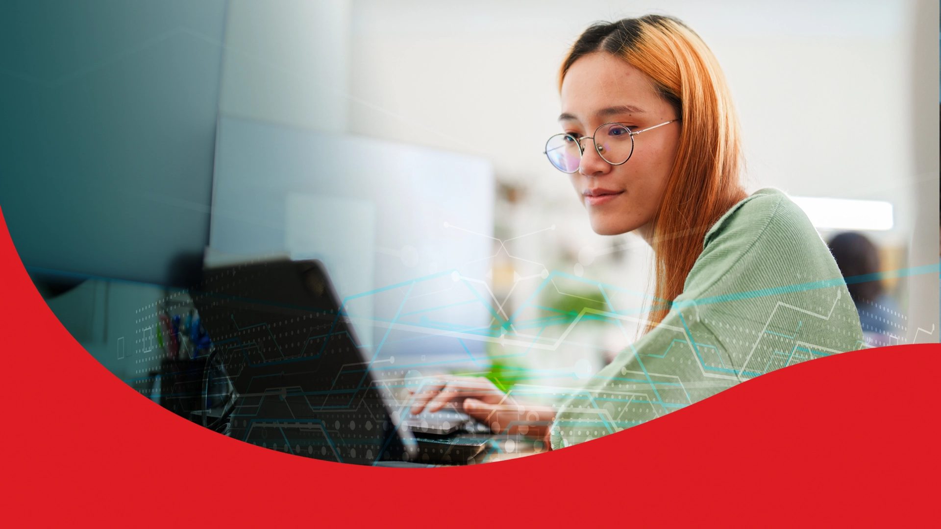 Young woman in glasses working on a laptop, with digital data overlays.