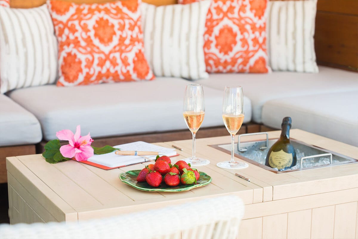 Interior design, Table, Furniture, Couch, Property, Tableware, Green, Orange, Flower, Textile