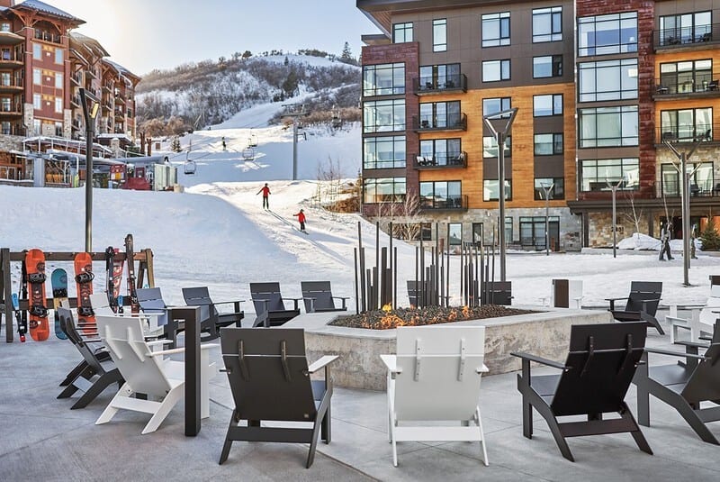 Urban design, Outdoor furniture, Building, Sky, Daytime, Property, Snow, Window, Table, Chair