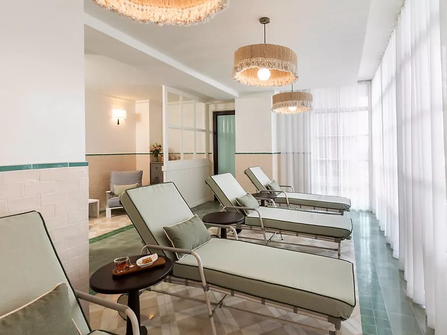Interior design, Living room, Property, Furniture, Building, Couch, Comfort, Lighting, Floor, Flooring
