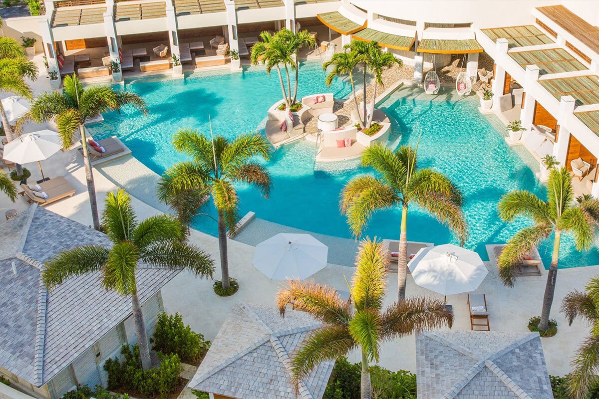 Swimming pool, Seaside resort, Urban design, Property, Water, Azure, Plant, Leisure, Aqua