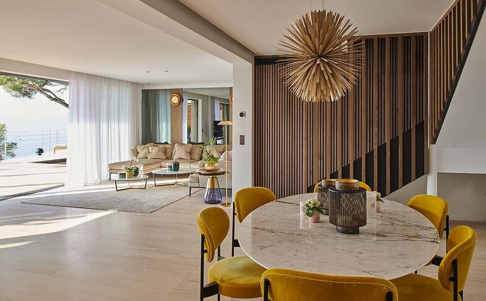 Interior design, Table, Furniture, Wood, Comfort, Chair, Yellow, Building, Flooring, Floor