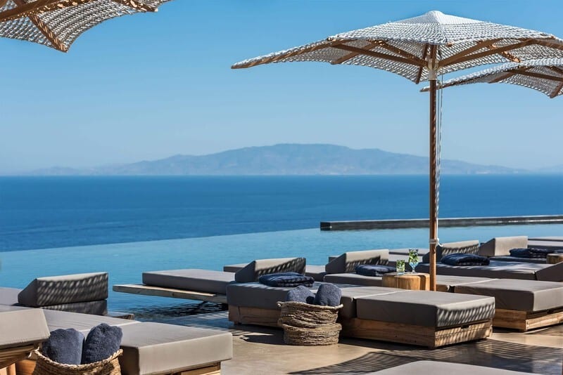 Outdoor furniture, Water, Sky, Property, Building, Azure, Shade, Table, Architecture