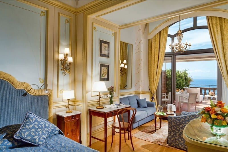 Picture frame, Interior design, Table, Furniture, Plant, Property, Building, Comfort, Yellow, Wood