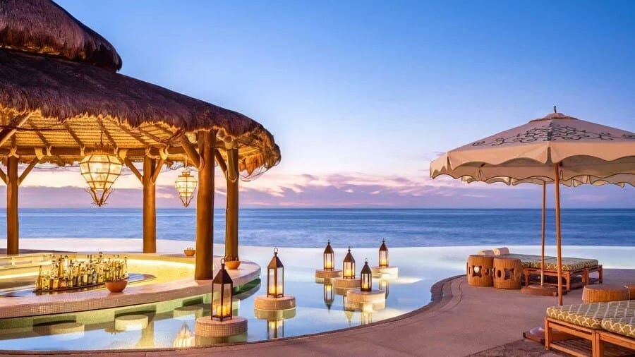 Seaside resort, Water, Sky, Property, Cloud, Azure, Shade, Beach, Lighting, Arecales