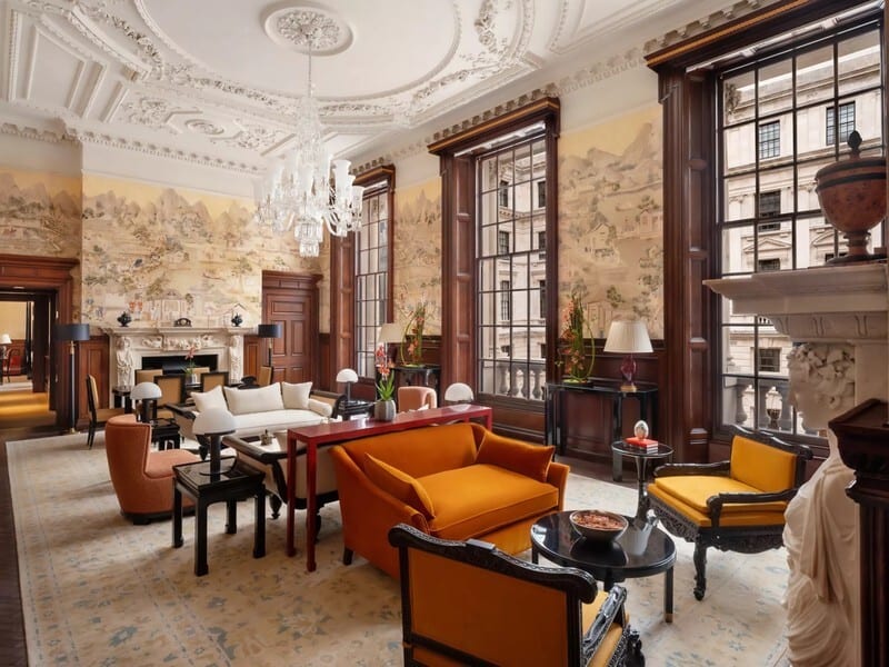Picture frame, Interior design, Living room, Furniture, Table, Property, Couch, Lighting, Window, Building
