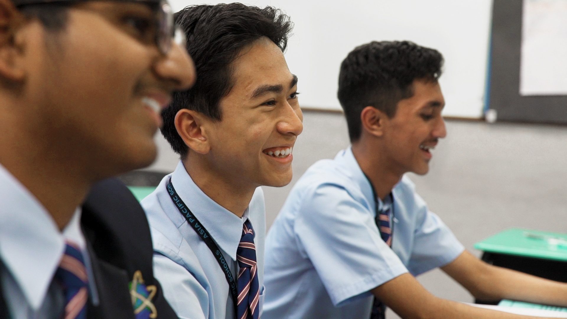 Facial expression, School uniform, Smile, Human, Gesture, Happy