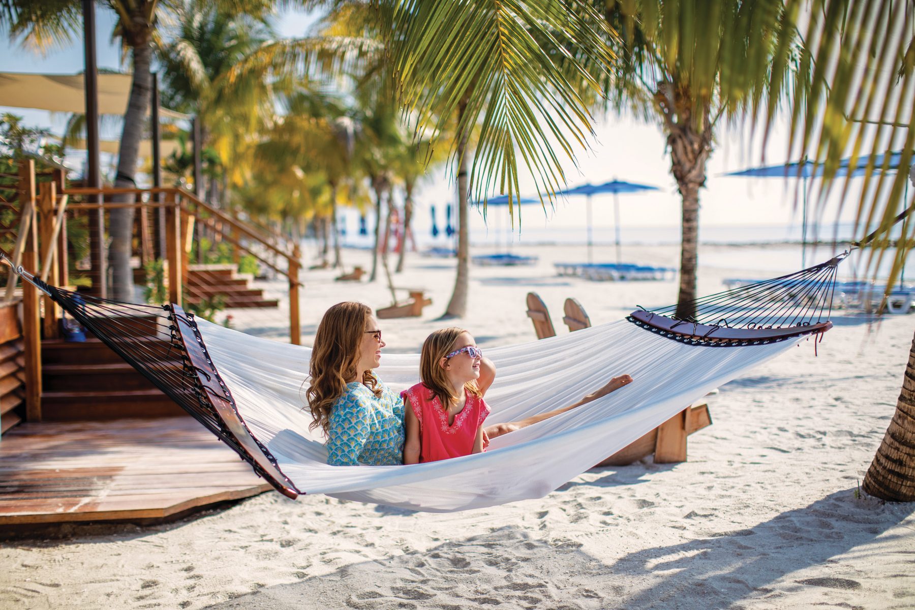 People on beach, Outdoor furniture, Hammock, Nature, Water, Azure, Shade, Sunlight, Travel