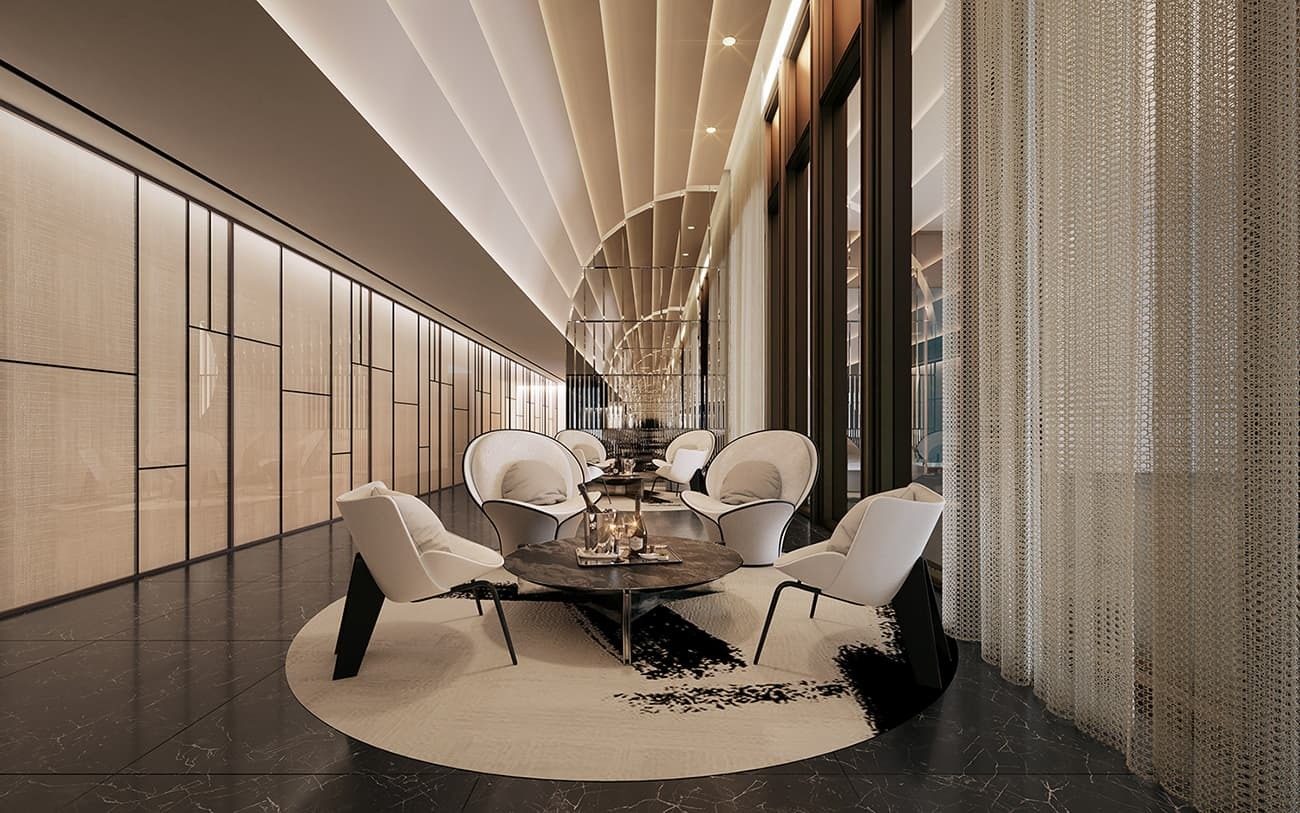 Modern lounge with white chairs, patterned rug, textured walls, ribbed ceiling, and dark floor.