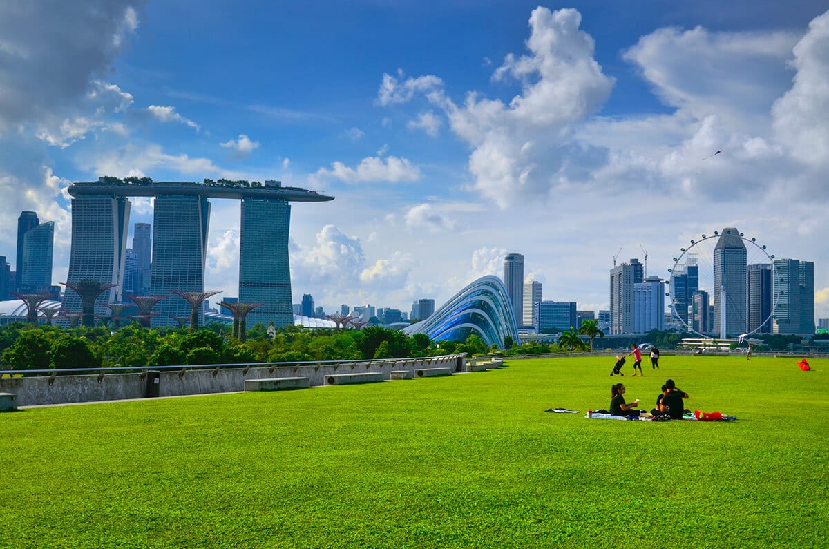 Public space, Urban design, High-rise building, Daytime, Grass, Cloud, Metropolis, Recreation