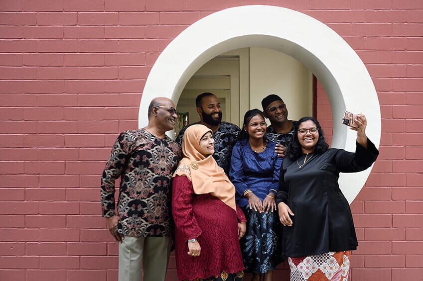 People, Sleeve, Smile, Happiness, Temple, Standing, Textile, Waist