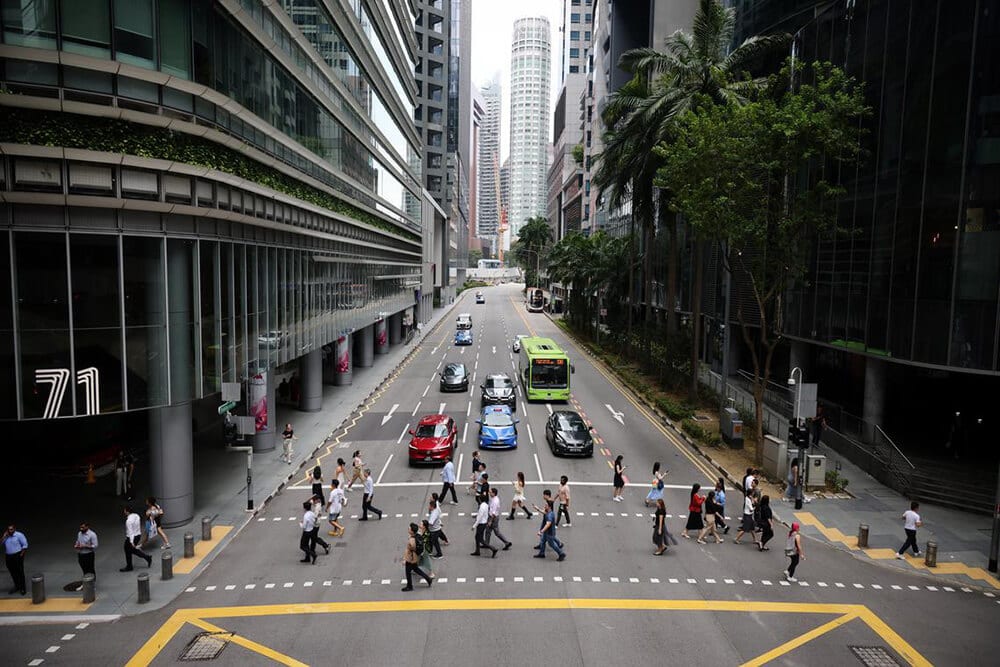 Urban area, High-rise building, City, Road, Street, Metropolis, Thoroughfare, Asphalt, Pedestrian