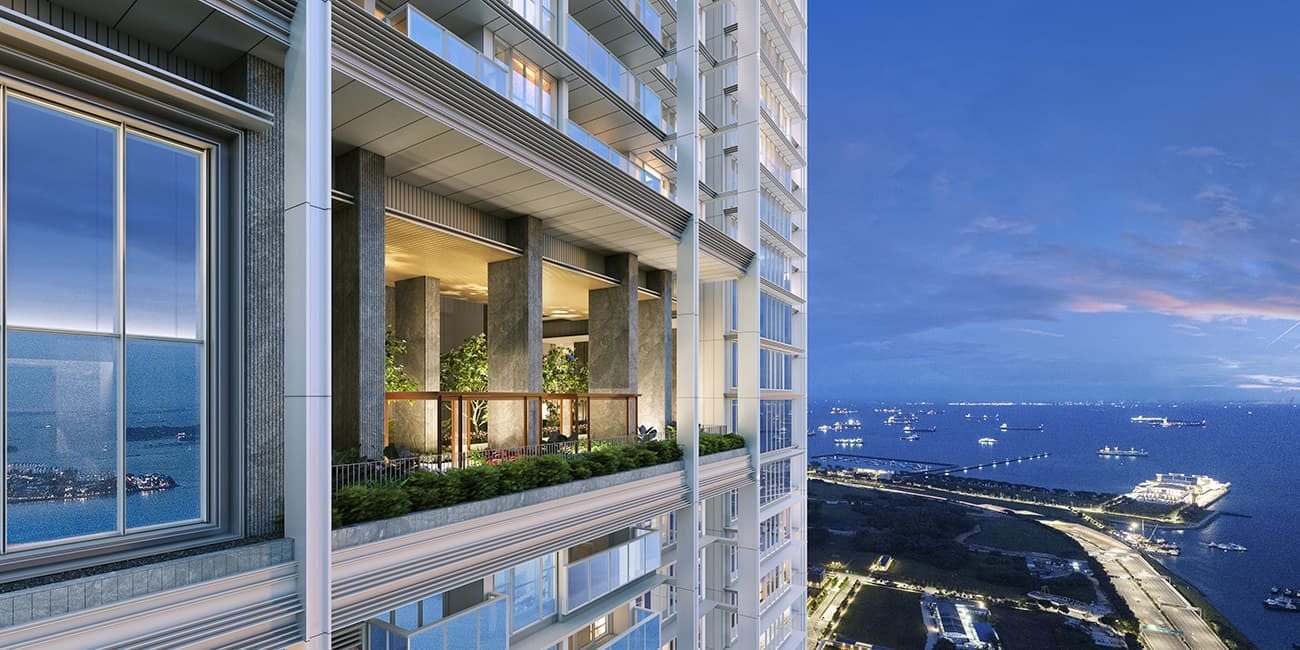 Modern high-rise balcony overlooks a busy bay with city lights at dusk.