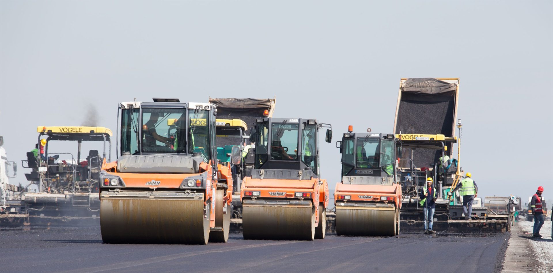 Automotive tire, Motor vehicle, Road surface, Sky, Truck, Asphalt, Wheel, Rolling