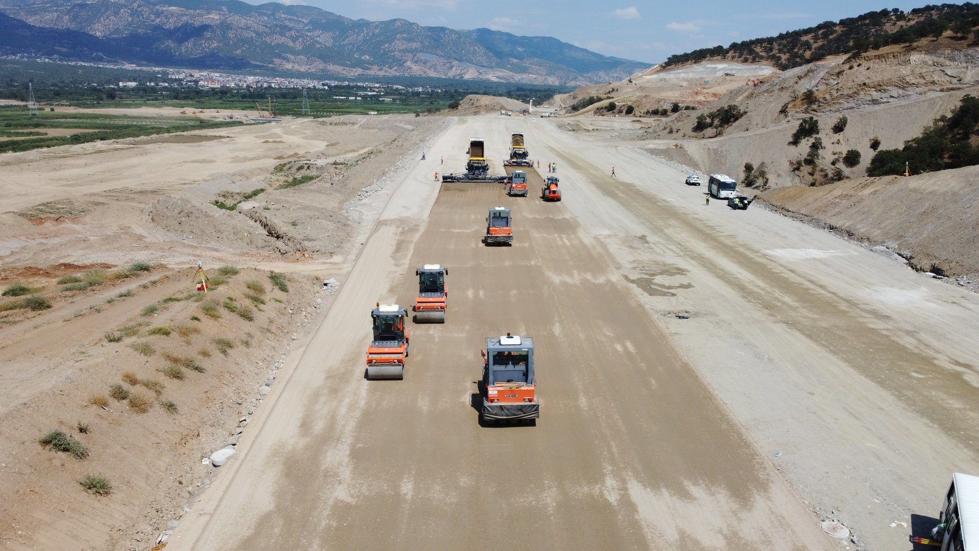 Land vehicle, Road surface, Car, Tire, Cloud, Truck, Asphalt, Infrastructure