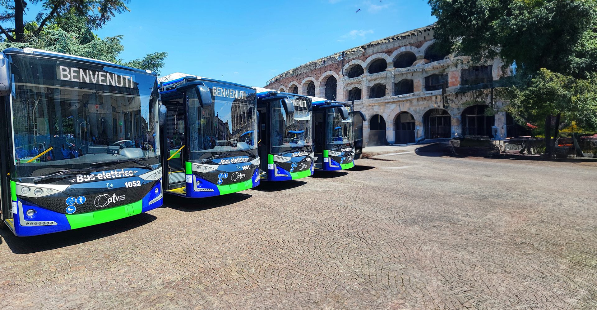 Tour bus service, Motor vehicle, Sky, Building, Tire, Wheel, Asphalt