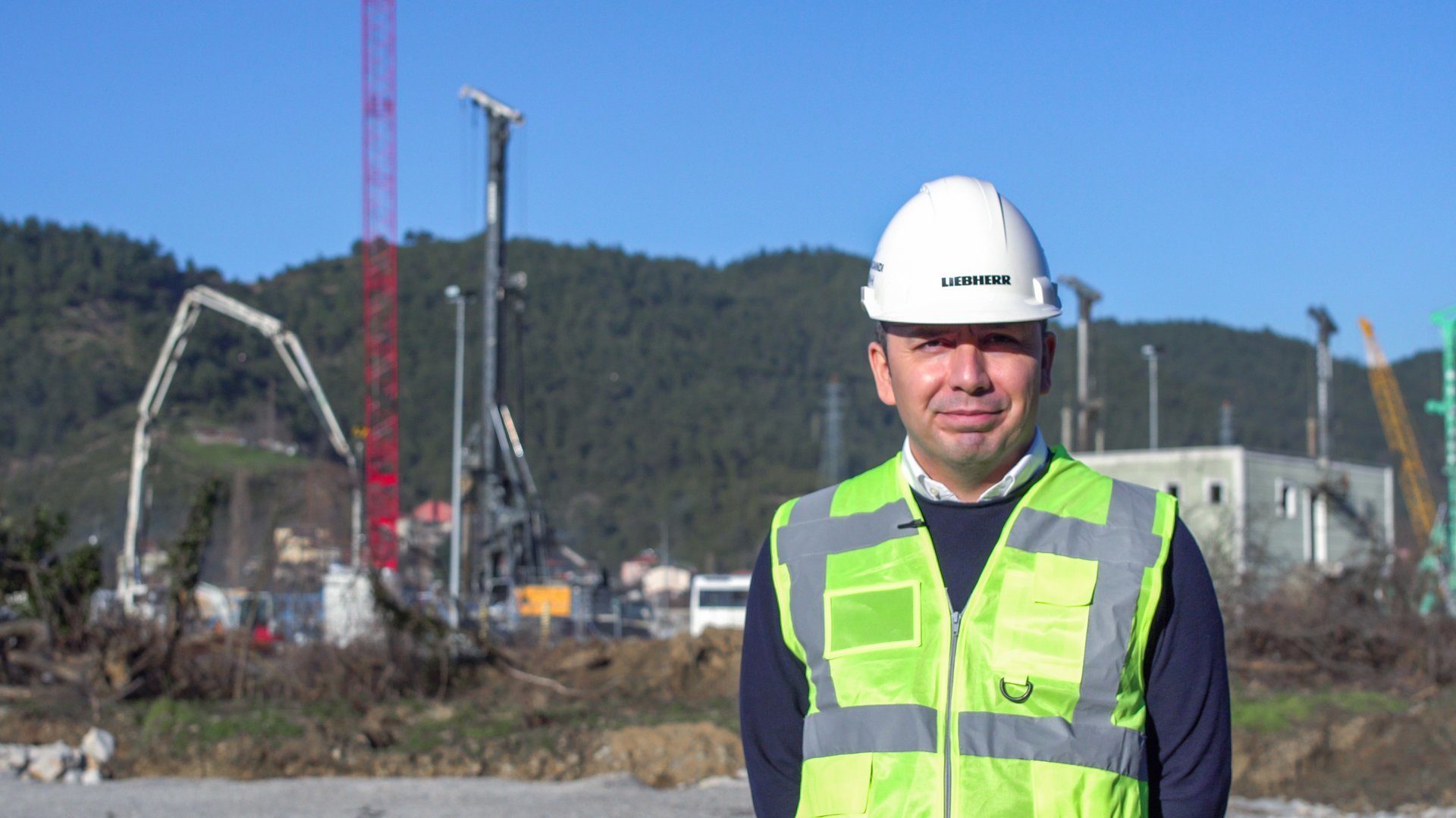Hard hat, High-visibility clothing, Natural environment, Sky, Workwear, Plant, Helmet, Tradesman, Engineer, Sleeve