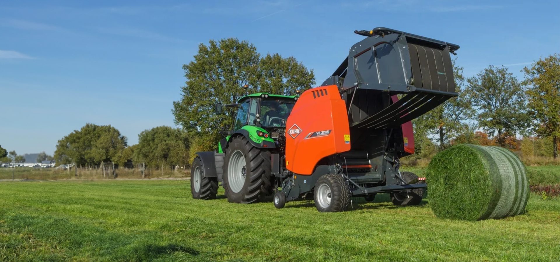 Automotive tire, Agricultural machinery, Wheel, Sky, Tractor, Plant, Vehicle, Tree, Tread
