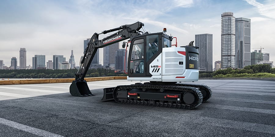 Automotive tire, Road surface, Cloud, Sky, Vehicle, Wheel, Building, Asphalt