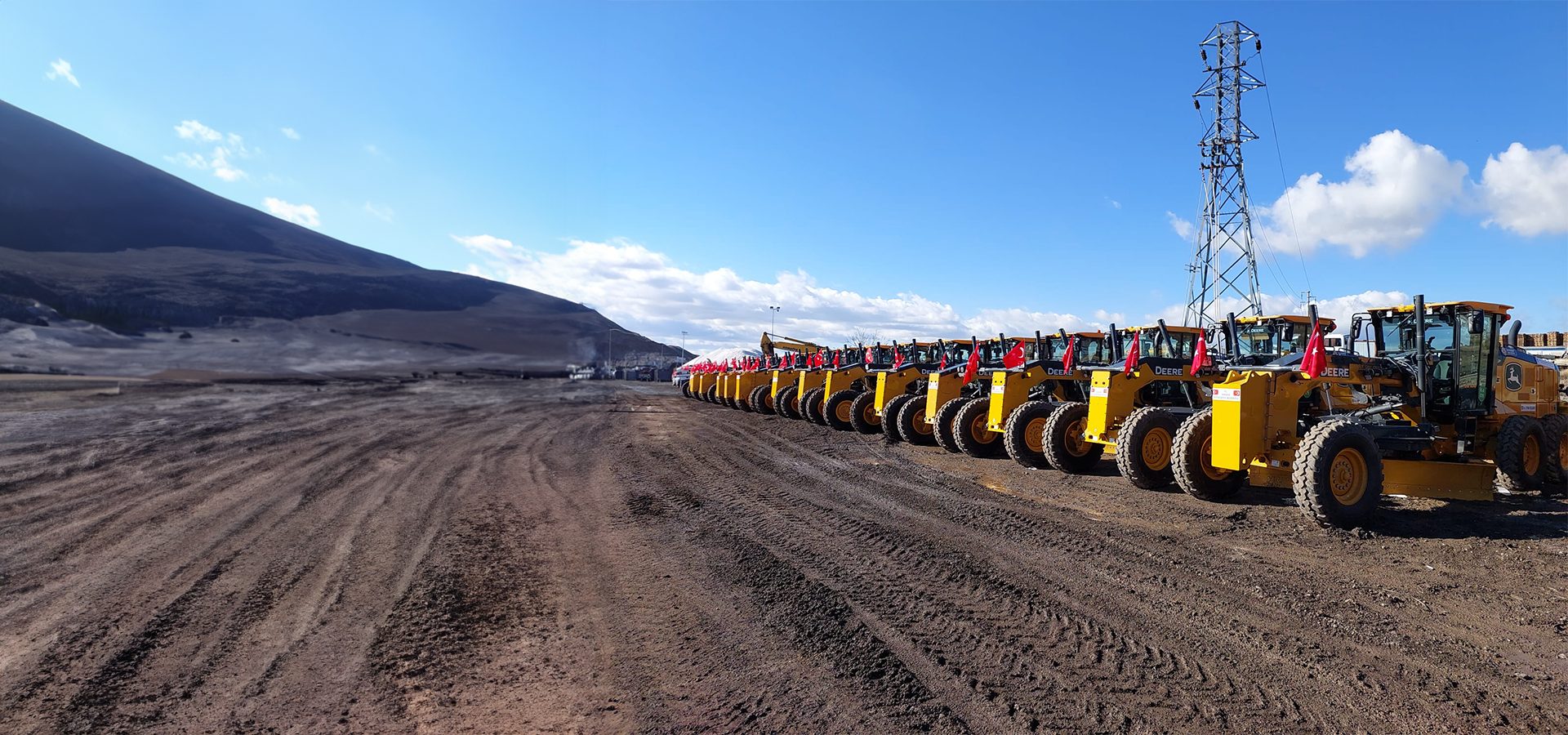 Automotive tire, Road surface, Motor vehicle, Sky, Wheel, Cloud, Asphalt, Tread