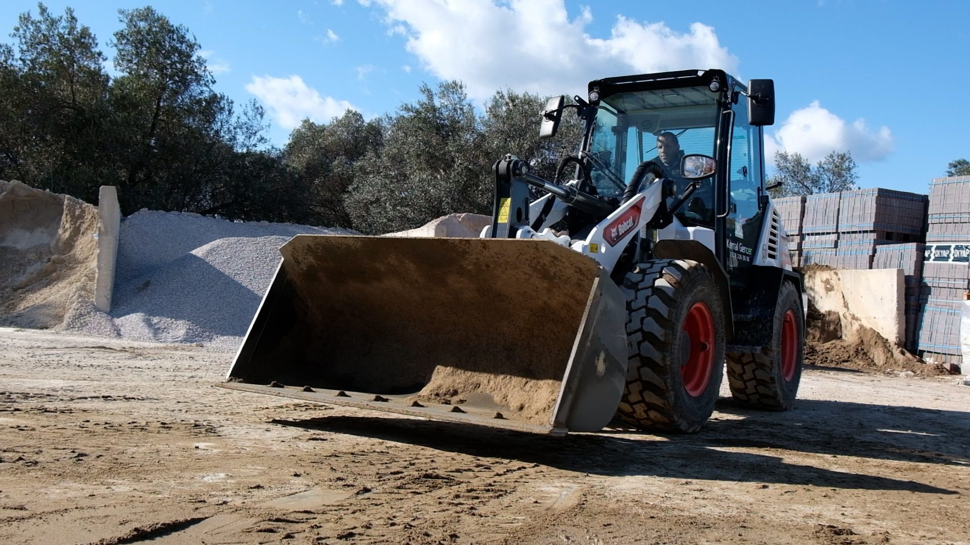 Automotive tire, Motor vehicle, Wheel, Cloud, Sky, Tree, Asphalt, Rolling