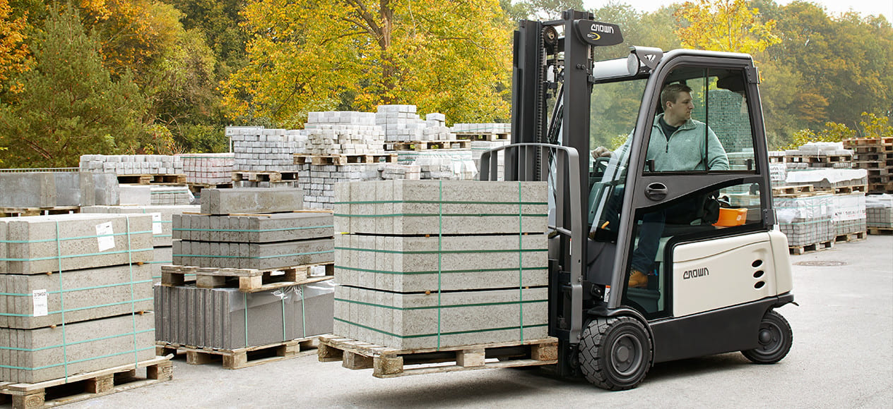 Motor vehicle, Automotive tire, Forklift truck, Road surface, Wheel, Tree, Yellow, Asphalt