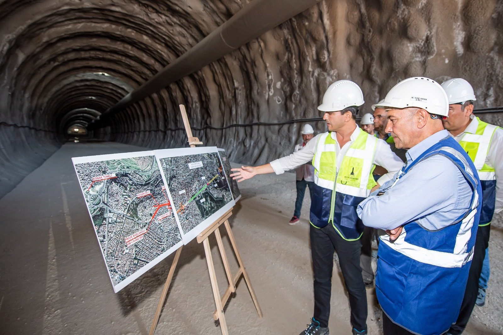 Hard hat, Clothing, Infrastructure, Tradesman, Easel, Workwear