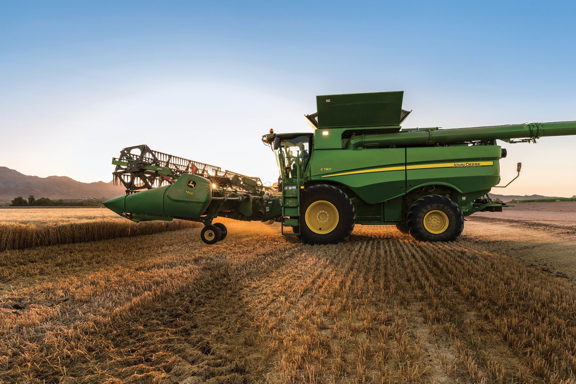 Automotive tire, Natural environment, Agricultural machinery, Wheel, Sky, Vehicle, Plant, Truck, Harvester