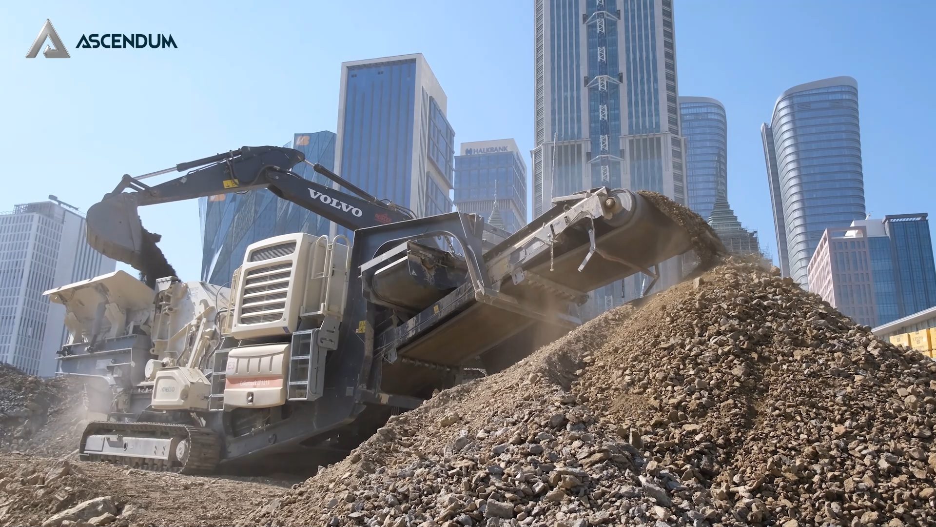Automotive tire, Building, Sky, Skyscraper, Vehicle, Asphalt