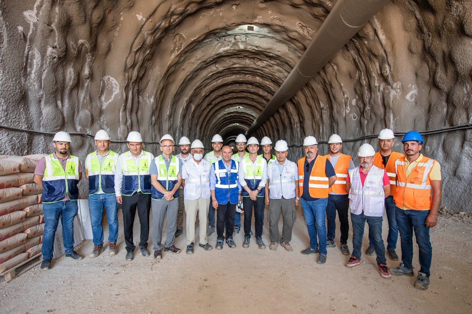 Hard hat, Jeans, Trousers, Workwear, Infrastructure, Helmet, Building, Smile