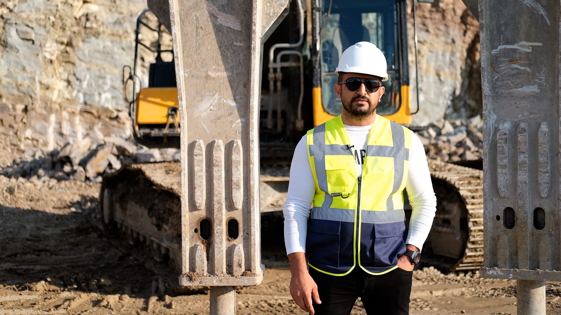 Hard hat, High-visibility clothing, Workwear, Tradesman, Sunglasses, Helmet, Engineer, Sleeve, Goggles, Asphalt