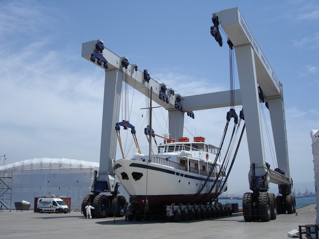 Naval architecture, Sky, Cloud, Boat, Vehicle, Wheel, Watercraft, Tire
