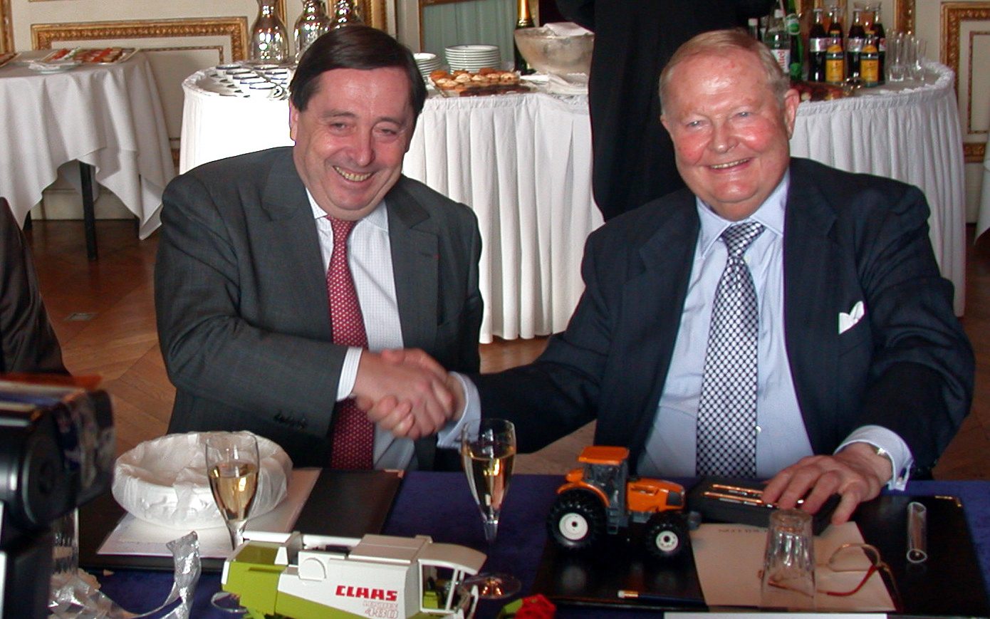 Wine glass, Smile, Tableware, Tie, Coat, Chair, Suit