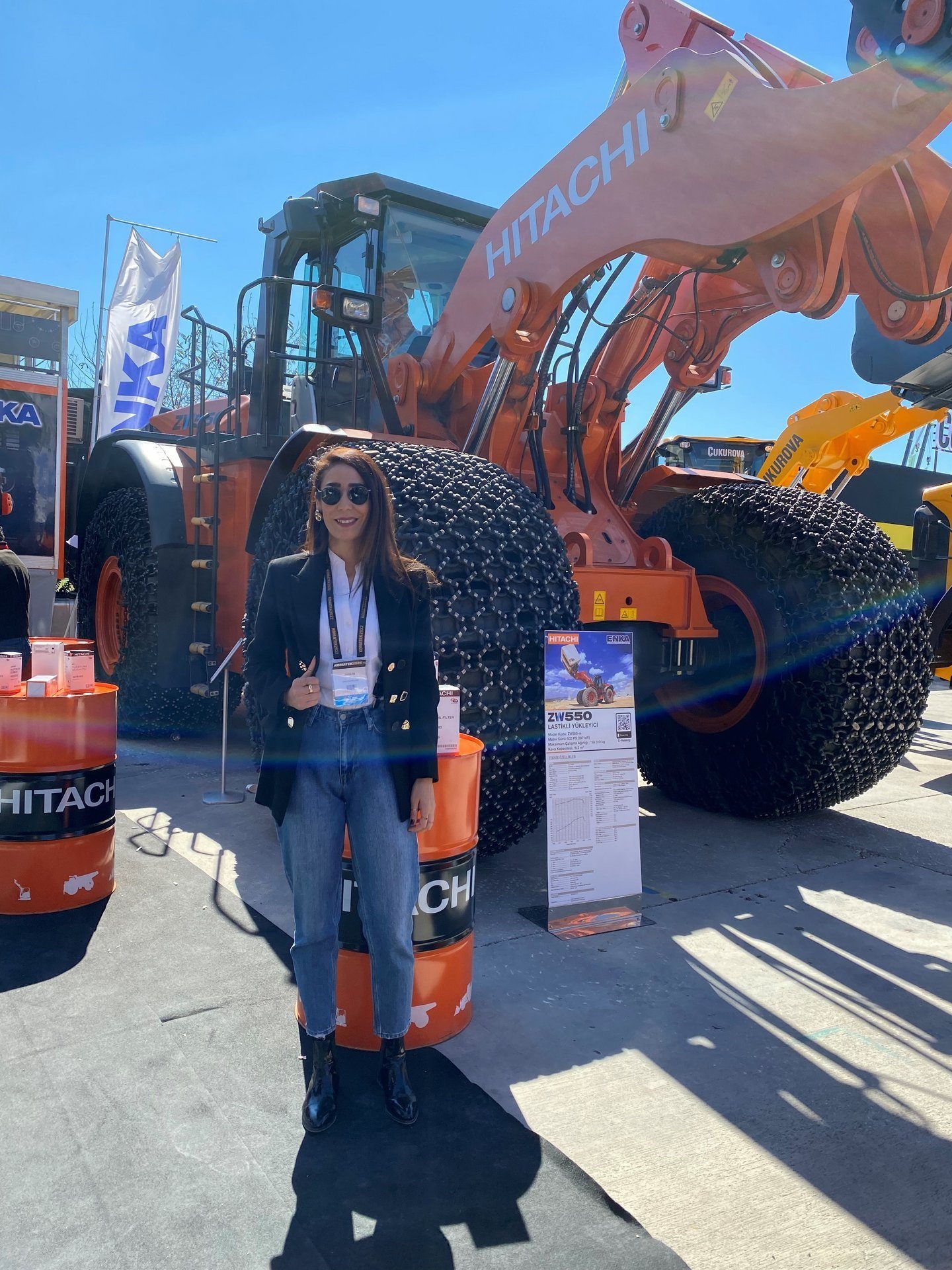 Automotive tire, Road surface, Sky, Vehicle, Asphalt, Workwear