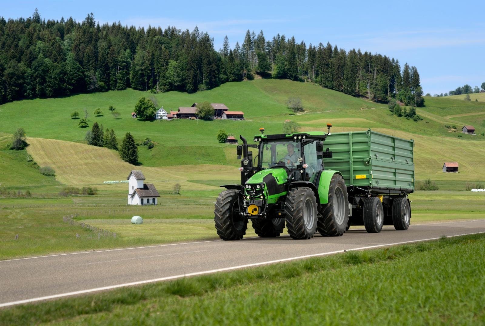 Motor vehicle, Automotive tire, Wheel, Sky, Plant, Tractor, Ecoregion, Tree