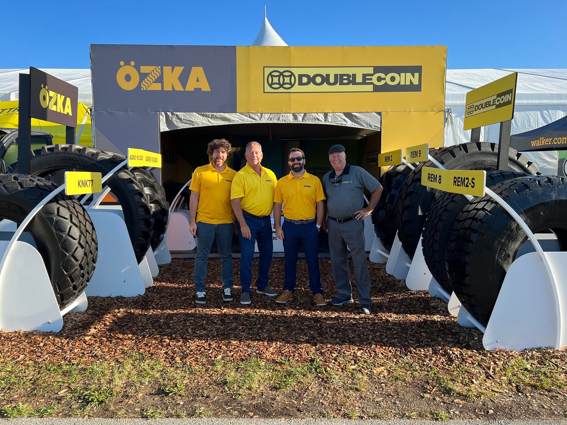 Motor vehicle, Automotive tire, Sky, Asphalt, Workwear