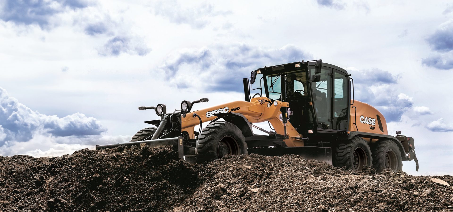 Automotive tire, Motor vehicle, Cloud, Wheel, Sky, Truck, Tread, Tree