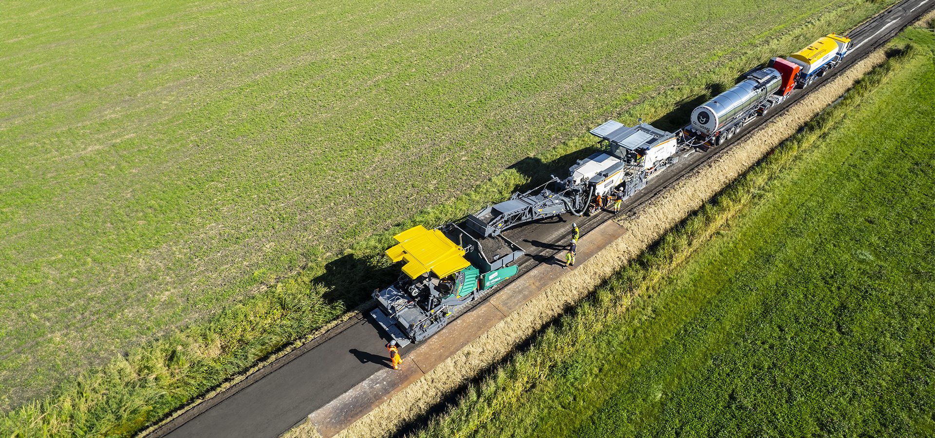 Motor vehicle, Land lot, Ecoregion, Wheel, Plant, Asphalt, Grass, Rolling, Grassland