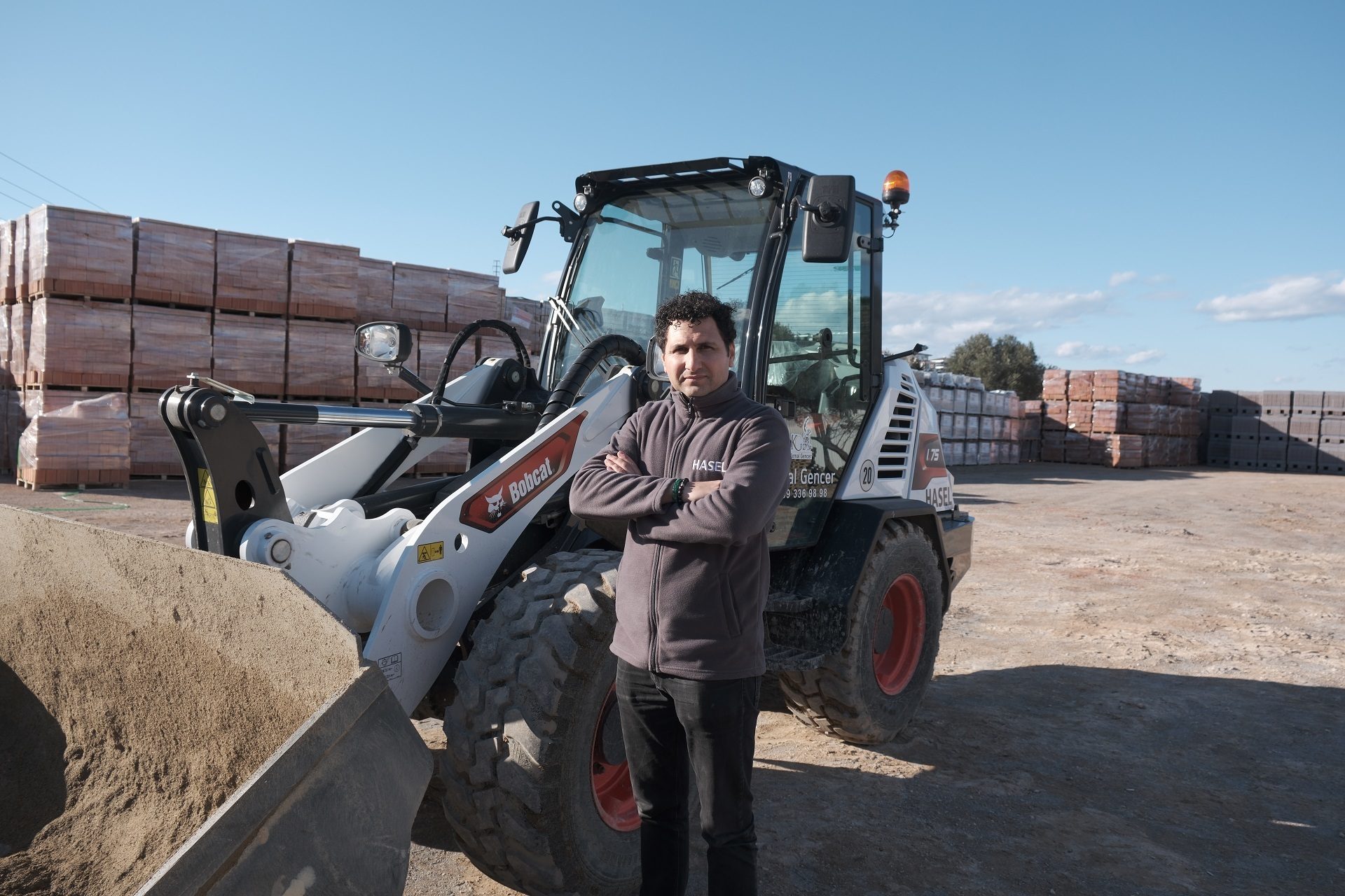 Automotive tire, Motor vehicle, Road surface, Wheel, Sky, Tread, Asphalt, Rolling