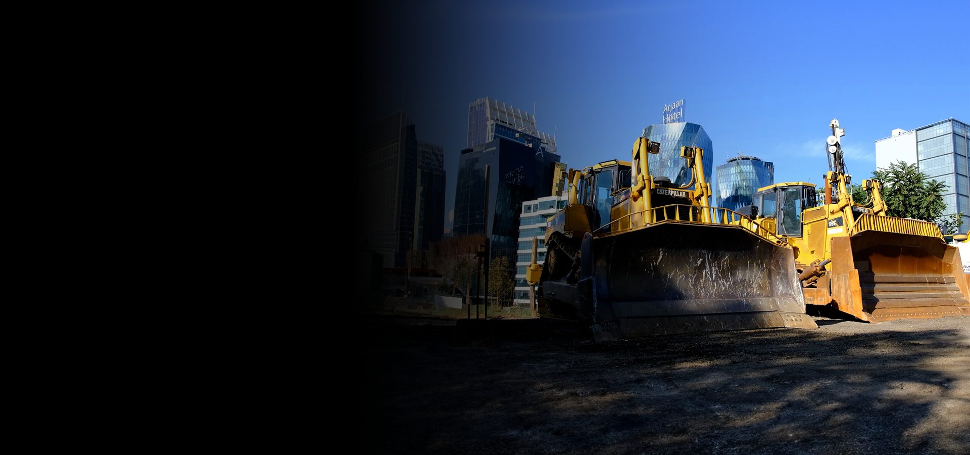 Automotive tire, Road surface, Sky, Building, Asphalt, Vehicle