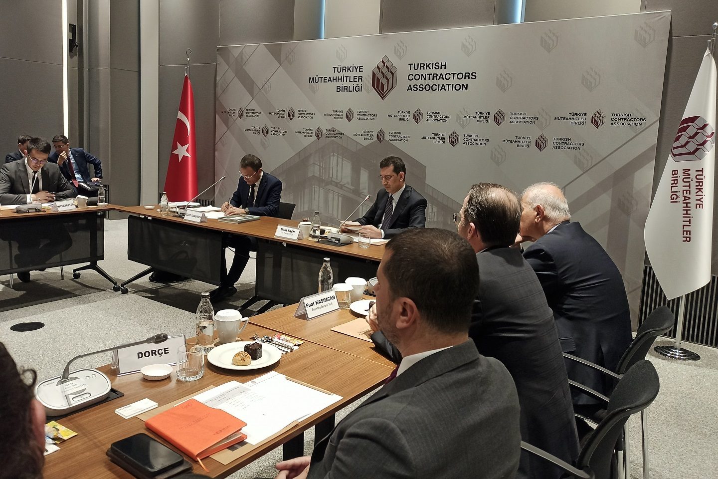 Automotive design, Table, Furniture, Coat, Chair, Desk, Suit