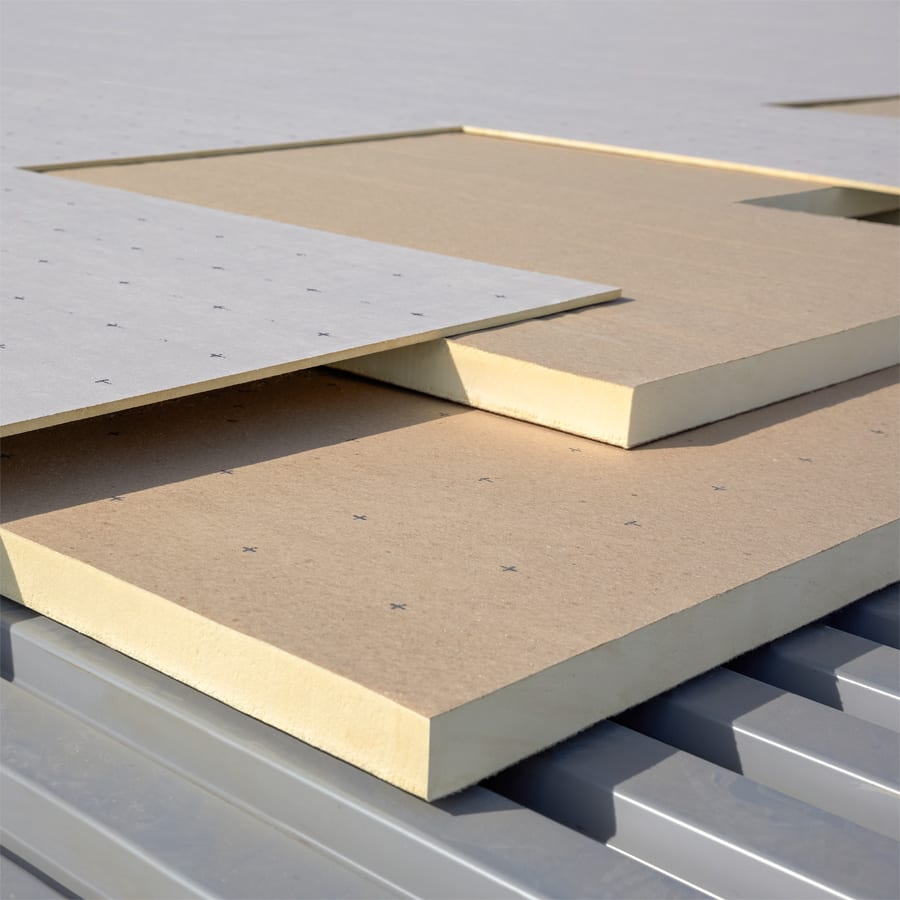 Insulation boards (foam and grey) on a metal deck.