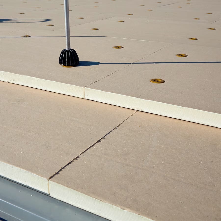 Closeup of insulation segments on a commercial roof.