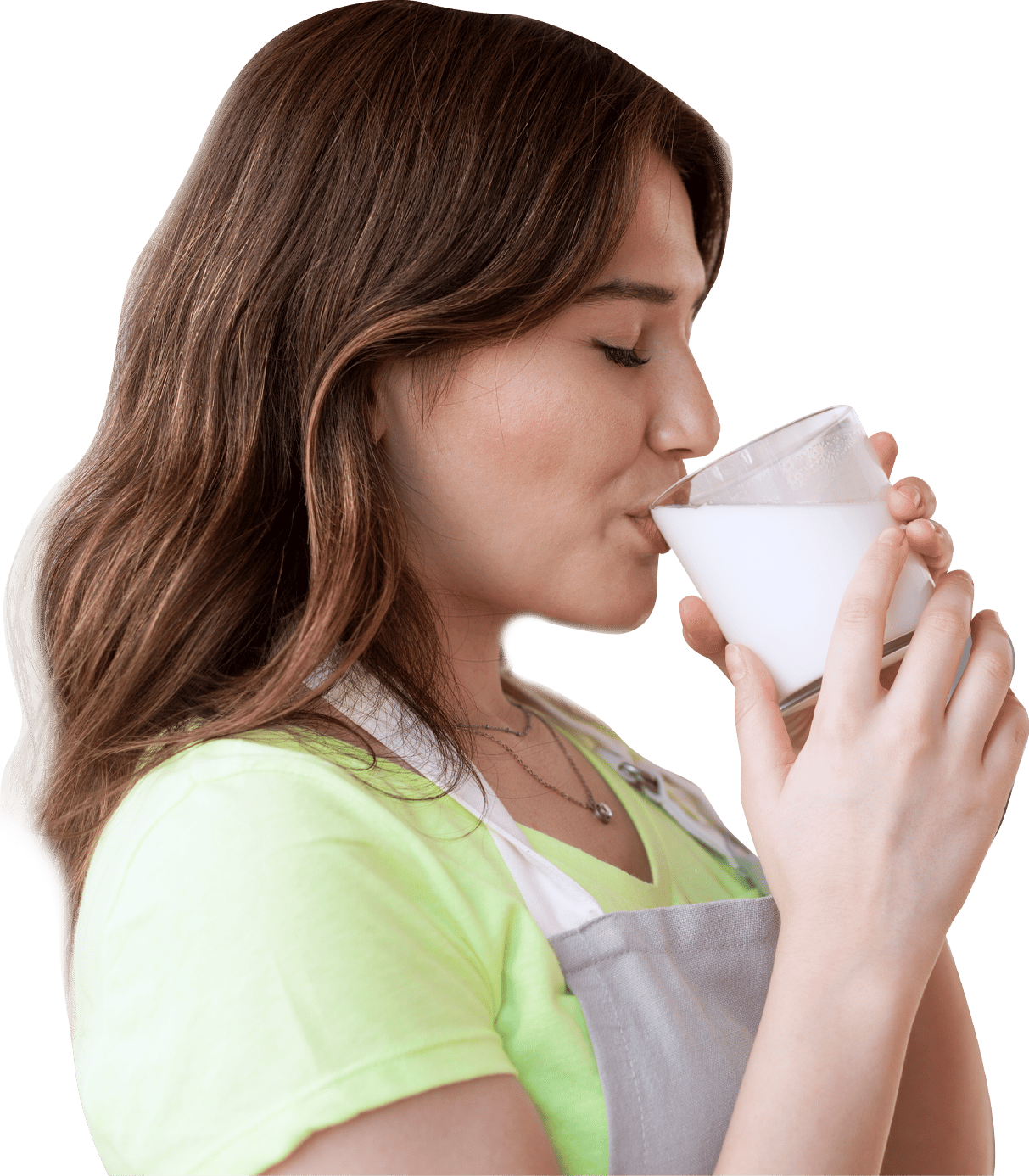 side view of a woman enjoying a glass of milk