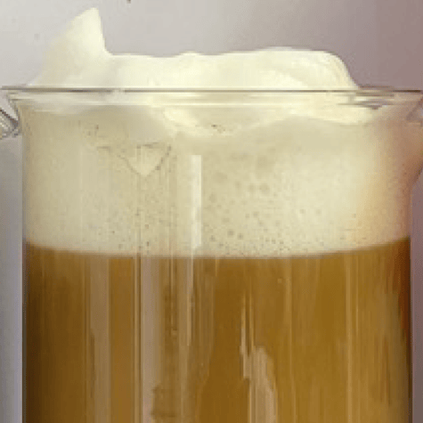 Closeup of curdling on milk containing enzymes