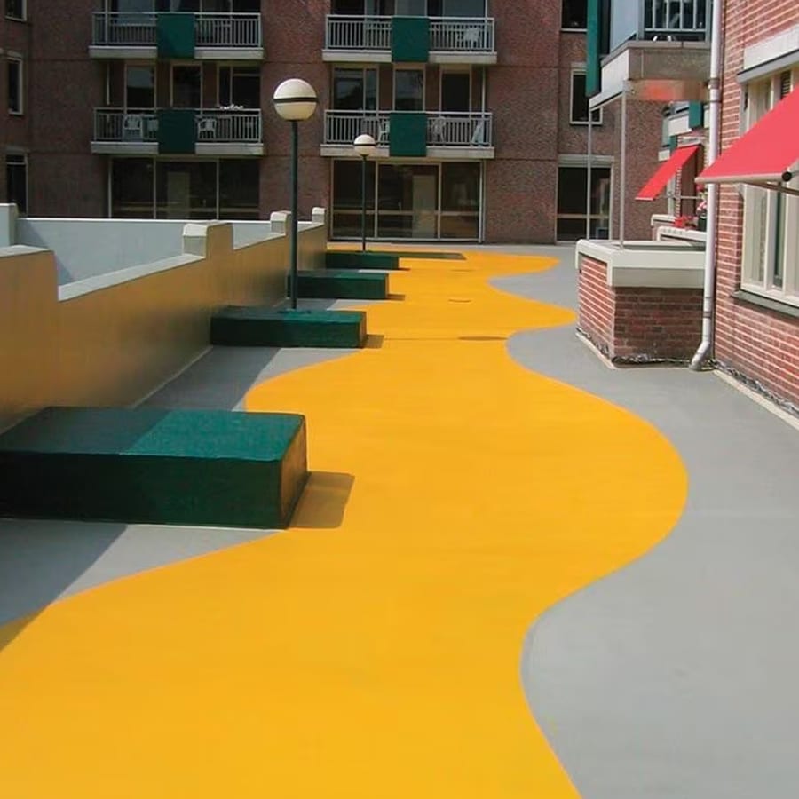 PMMA applied to a roof's surface with pedestrian access.