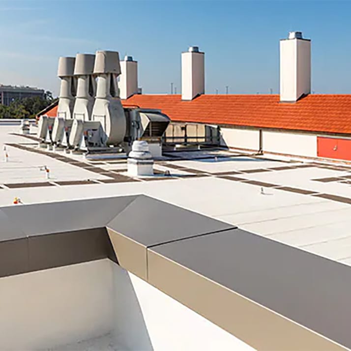 Closeup of a roof-to-wall transition.